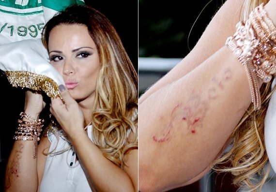 Viviane Araújo teve que encarar sessões de laser para apagar a tatuagem que fez em homenagem ao cantor Belo.